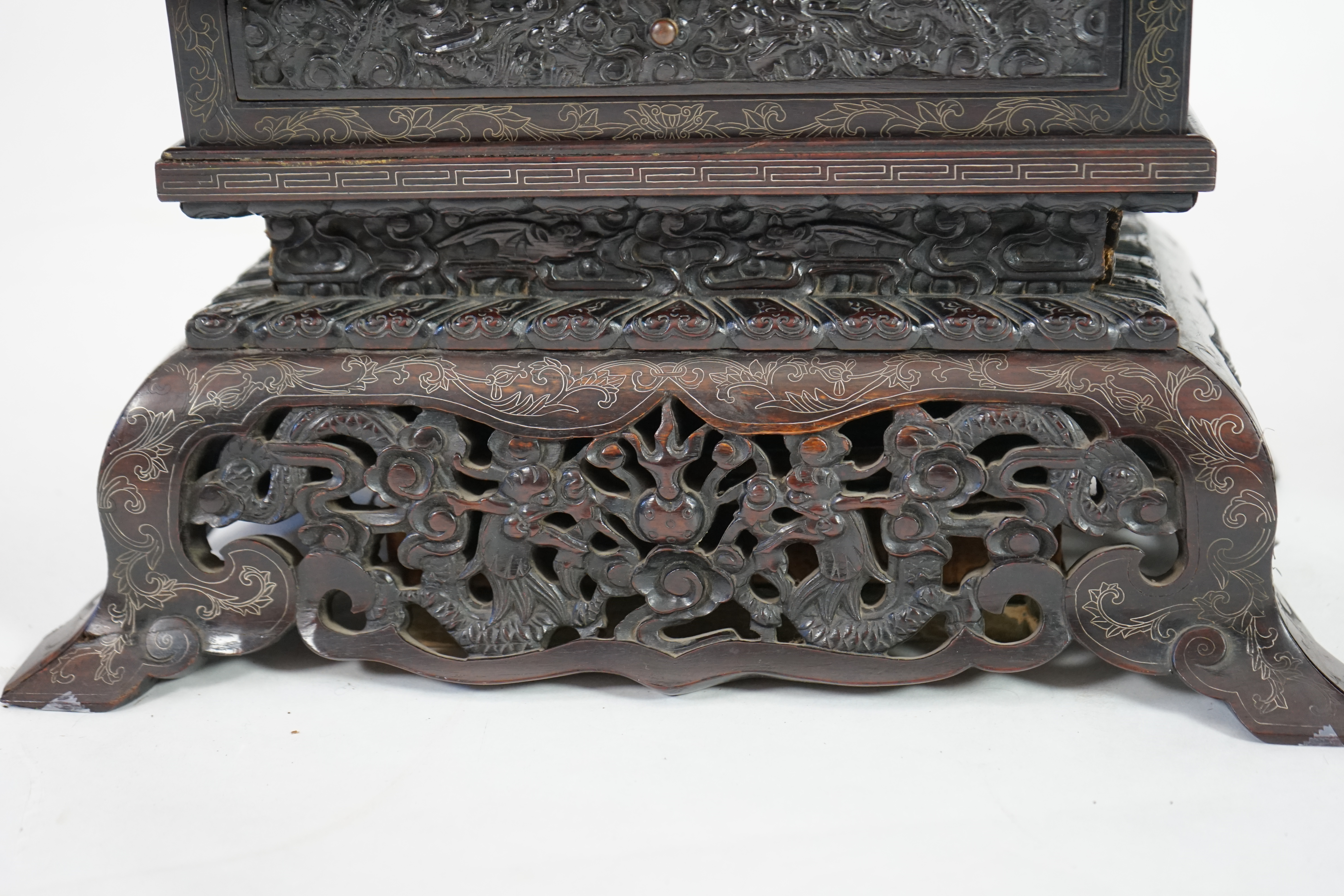 An important pair of Chinese carved zitan and silver wire inlaid ‘cloud and dragon’ curio cabinets and stands, duobaoge, probably Imperial, late Qing dynasty